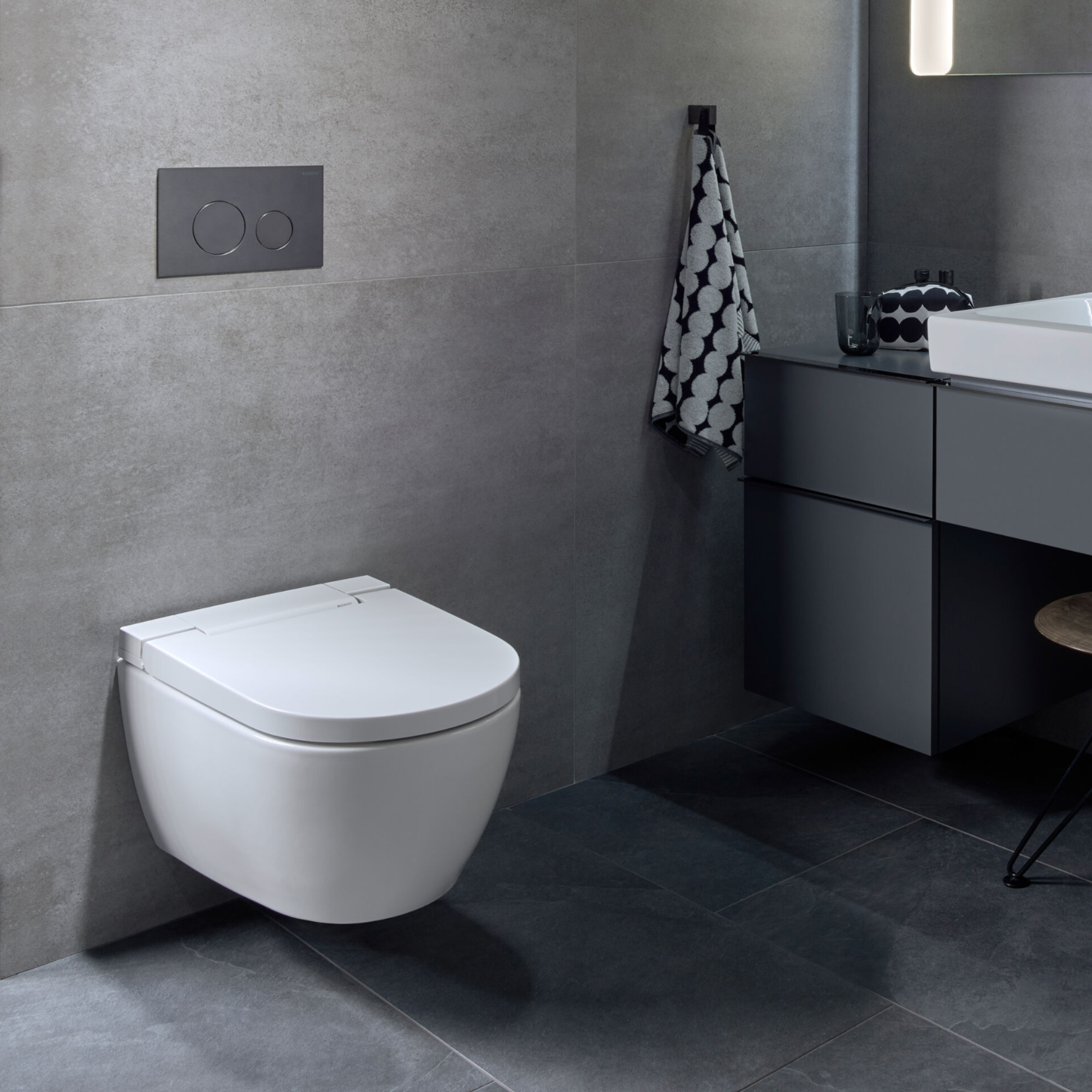 Geberit AquaClean Alba Rimless Wall Hung Smart Toilet with Wrap Over Soft Close Seat & Remote Control